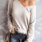 Exposed Seam V-Neck Fringe Hem Knit Top