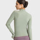 Millennia Half Zip Thumbhole Sleeve Sports Top